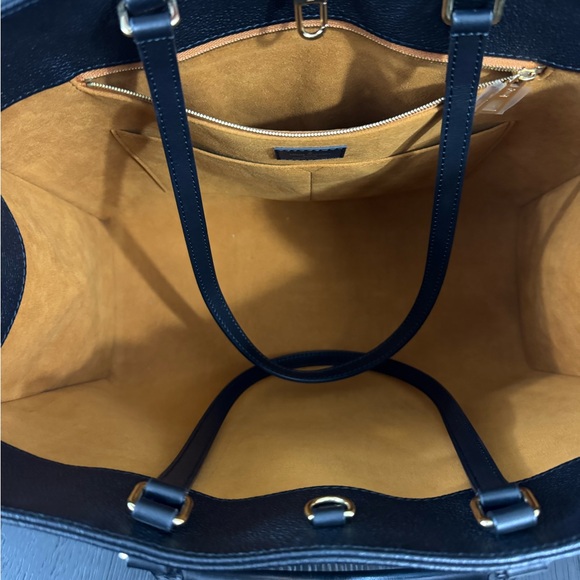 Louis Vuitton OnTheGo GM tote bag in black Monogram Empreinte leather - Picture 8 of 12